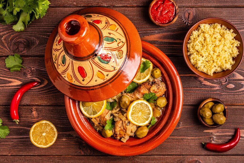 Traditional moroccan tajine of chicken with salted lemons, olives